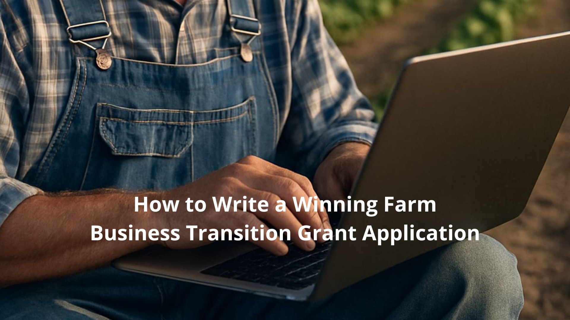 Farmer in denim overalls using a laptop outdoors while researching how to write a winning Farm Business Transition Grant application.